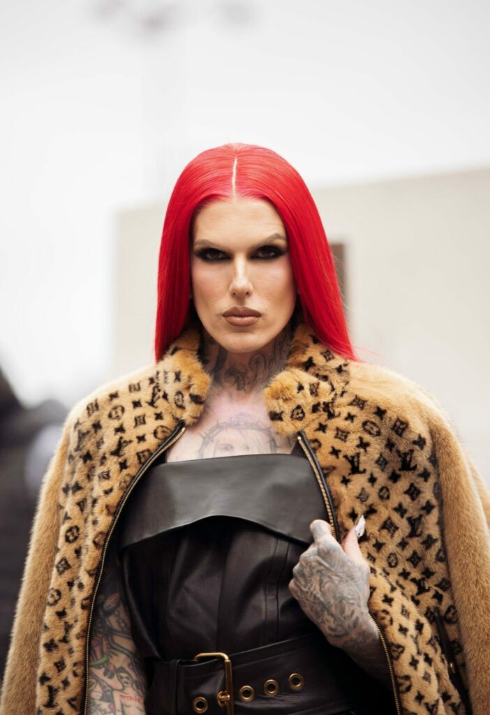 PARIS, FRANCE - MARCH 06: Jeffree Star is seen wearing a brown fur coat, Louis Vuitton jacket, black skirt and silver chain bag outside the Louis Vuitton show during Paris Fashion Week - Womenswear Fall Winter 2023 2024 on March 06, 2023 in Paris, France. (Photo by Raimonda Kulikauskiene/Getty Images)